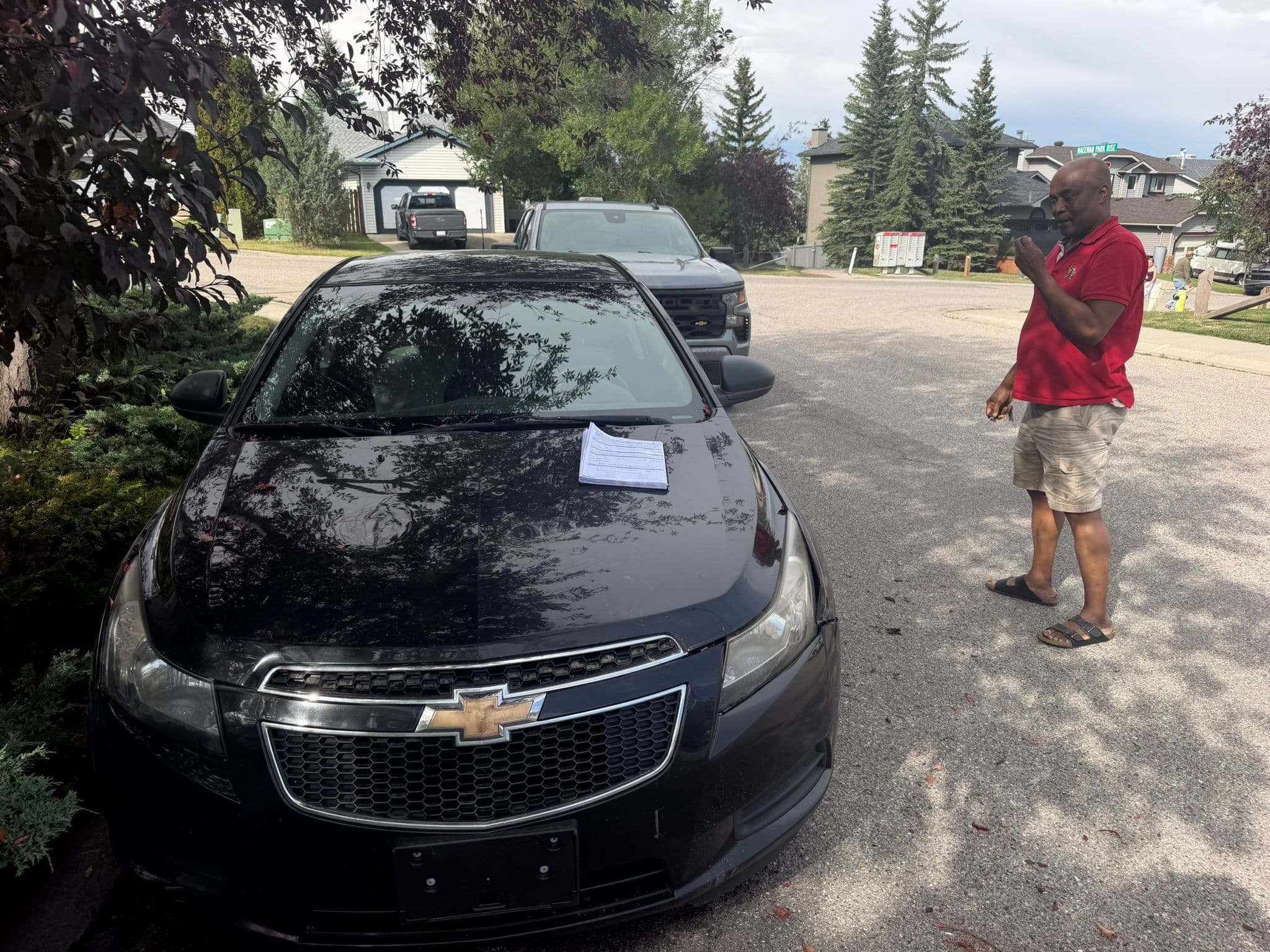 Black Chevrolet ready for vehicle recycling in Calgary